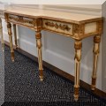 F16. Venetian style painted console table. 30"h x 72"w x 16"d  